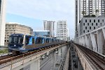 SB Metrorail approaching Govt Center Station-tracks below belong to Metromover 